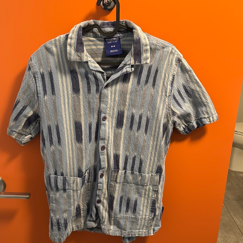 Men’s blue dress shirt, sized medium